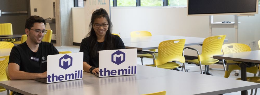 Students working on computers in The MILL
