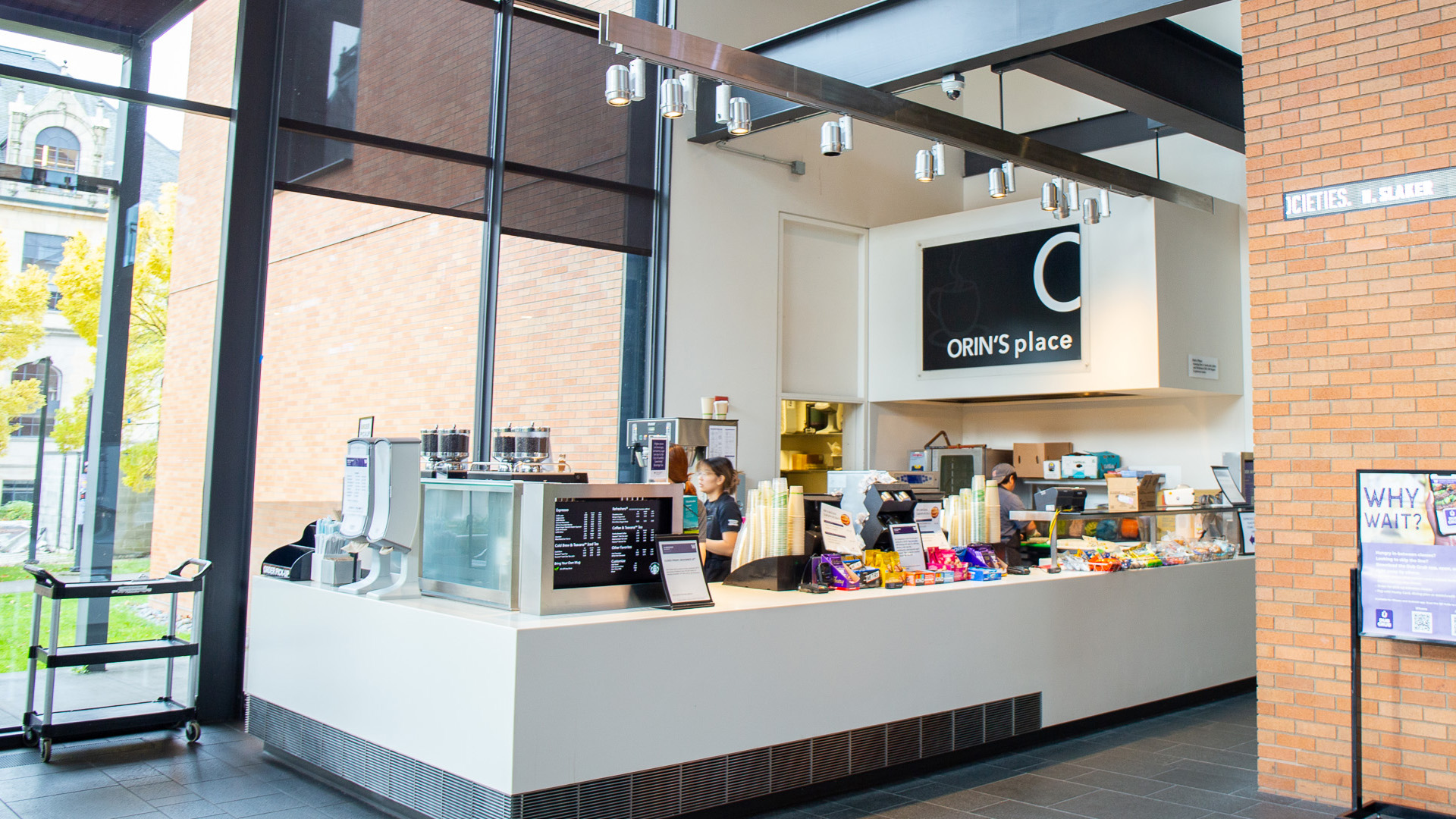 Barista at Orin's Place making espresso