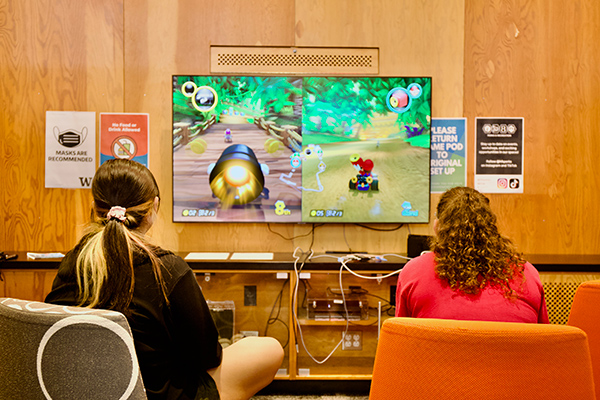 Students playing Mario Kart in Area01 game pod
