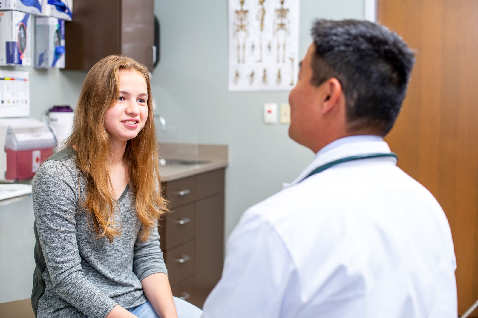 Student speaking with a primary care physician