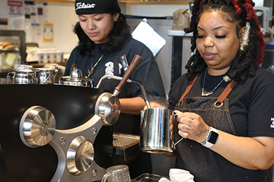 Students in line at Husky Den Cafe Espresso and Coffee Bar