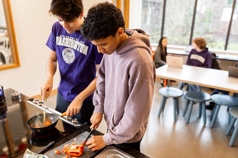 Students cooking on stovetop