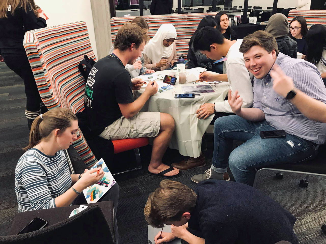 Students painting during an event hosted by the Residential Programming Board